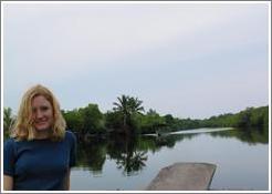 Eve on boat in the mangrove swamp.