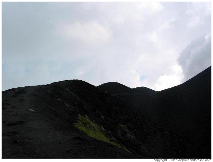 Black rock at start of cone.