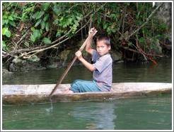 Boy in canoe.