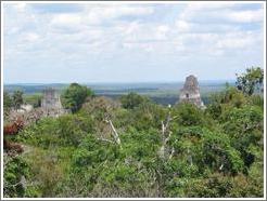 Tikal.  Templos I and II, as viewed from the big pyramid at Mundo Perdido.