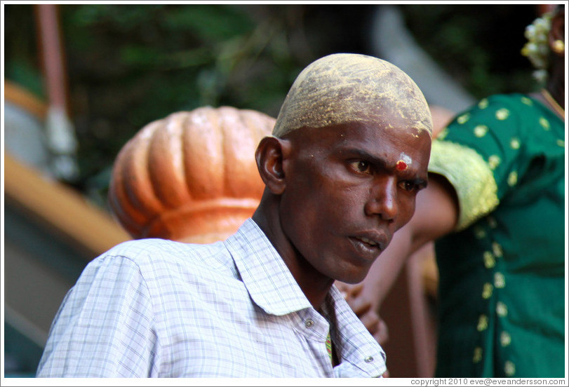 Man with painted head, Batu Caves.