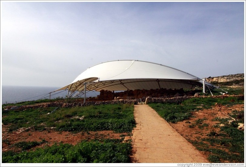Mnajdra, a megalithic temple complex, under a high-tech protective covering.