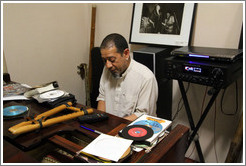 Cape Town jazz musician Hilton Schilder playing piano in his home.