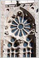 Window with fruit-like figures around it.  La Sagrada Fam?a.