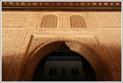 Arch leading to Patio del Cuarto Dorado, Nasrid Palace, Alhambra at night.
