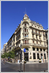 Building at the corner of Calle Reyes Cat?os and Gran V?de Col?city center.