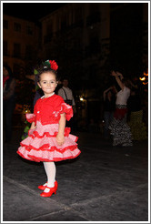 Girl in red.  Fiesta de las Cruces.  Plaza del Carmen.  City center.