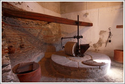 Olive crusher powered by water. 15th century Moorish olive oil mill, used by the town of Nig?elas until 1920. 