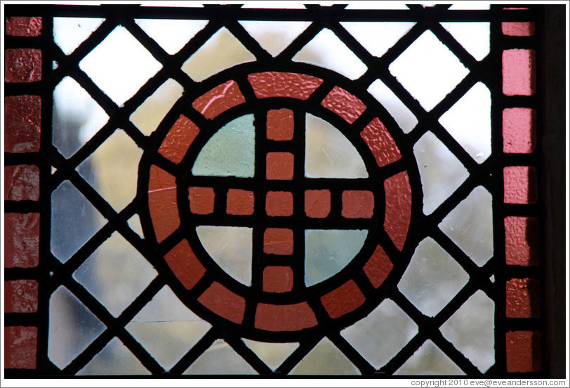 Cross symbol in stained glass, Brethren's Hall, Hospital of St Cross.