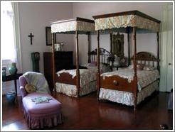 Oak Alley Plantation.  Bedroom.  The beds are quite short because the French immigrants from the 19th century tended to be under five feet tall.