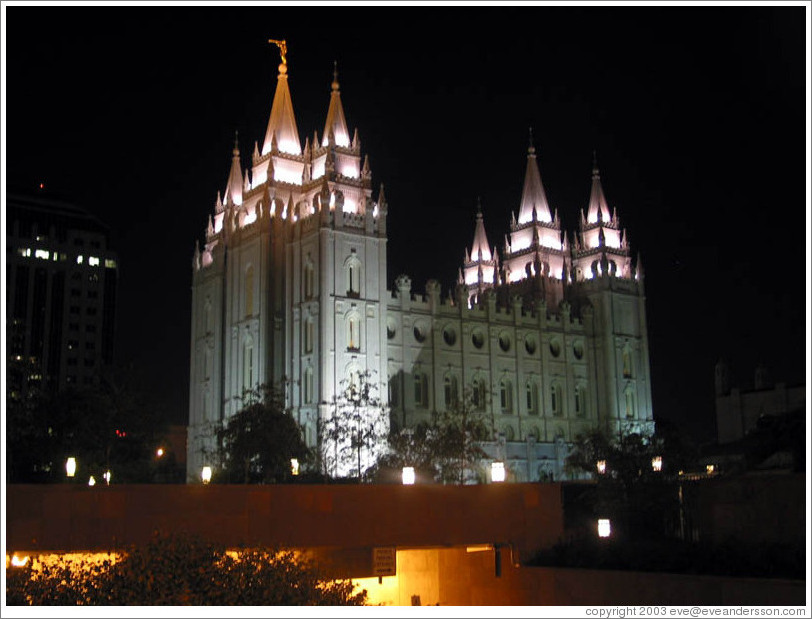 Illuminated temple at night.